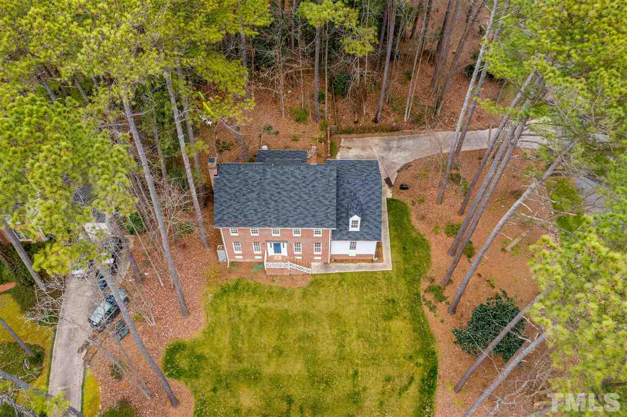 8101 Calais Court Raleigh, NC 27613 - Photo 3 of 24 a view of swimming pool with a yard
