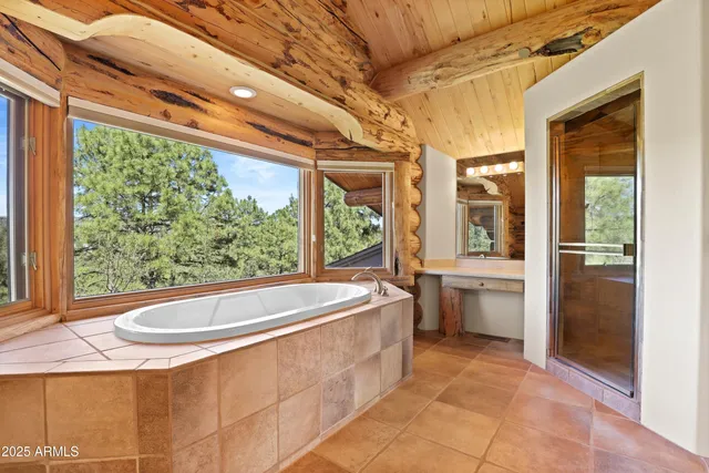a bath tub sitting in front of a window