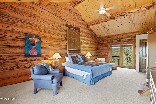 a bed room with furniture and a fireplace