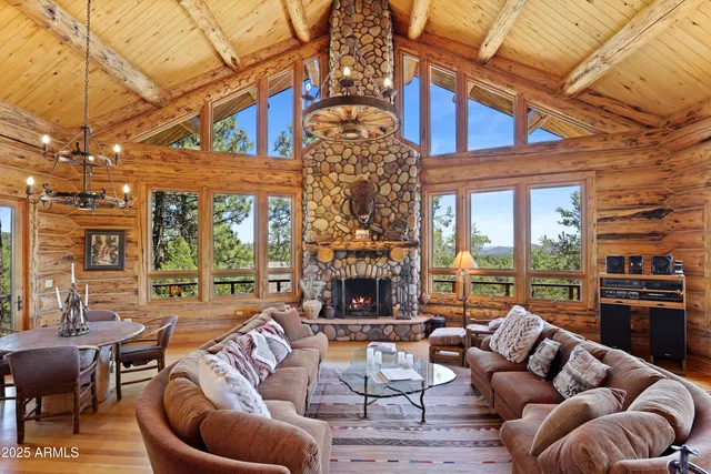 a outdoor living space with patio furniture and a fireplace