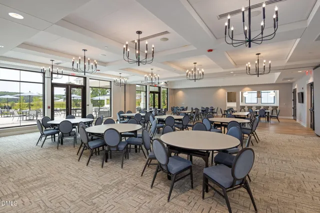 a view of a a dining room with furniture