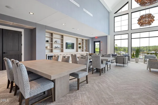 a room with lots of tables and chairs