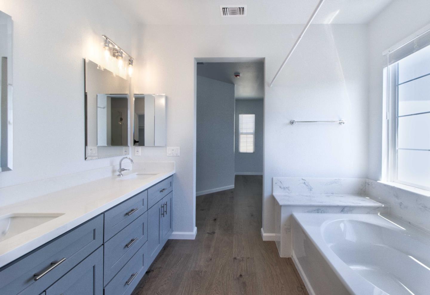 2715 Shellgate Circle Hayward, CA 94545 - Photo 26 of 47 a bathroom with a tub sink and mirror