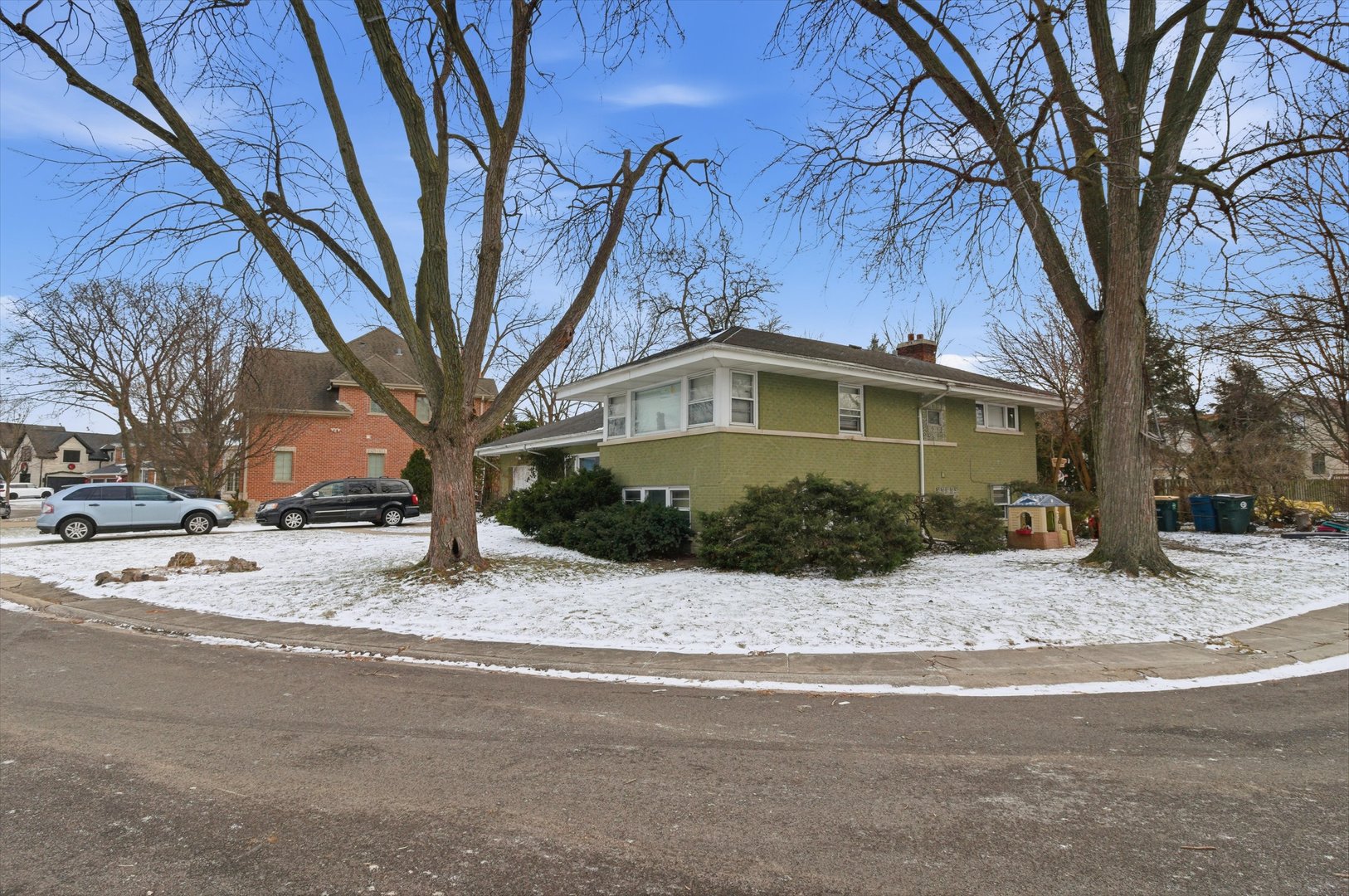 1009 Hastings Street Park Ridge, IL 60068 - Photo 2 of 9 a front view of a house with a yard