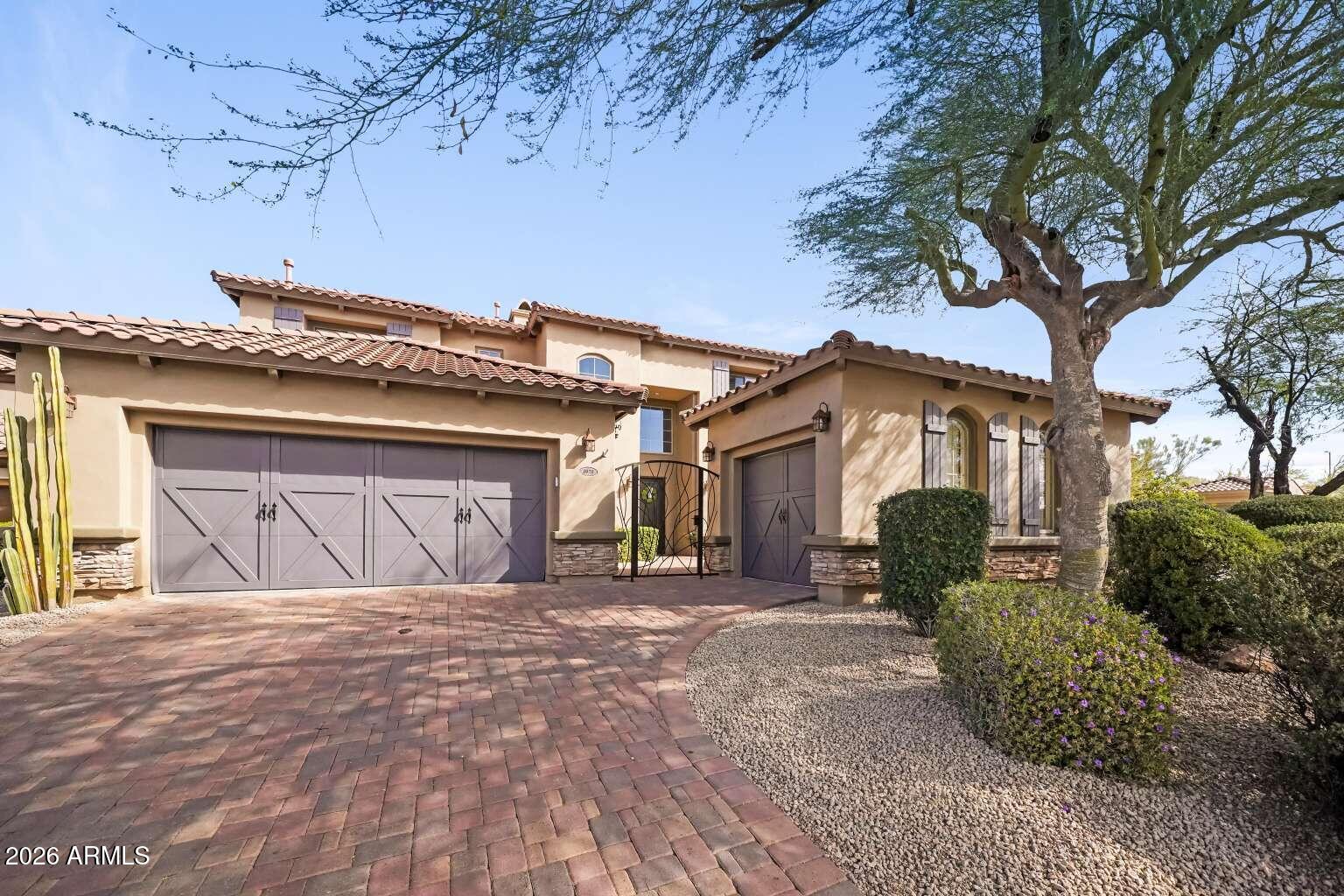 3978 East Hashknife Road Phoenix, AZ 85050 - Photo 2 of 29 a view of a house with a yard