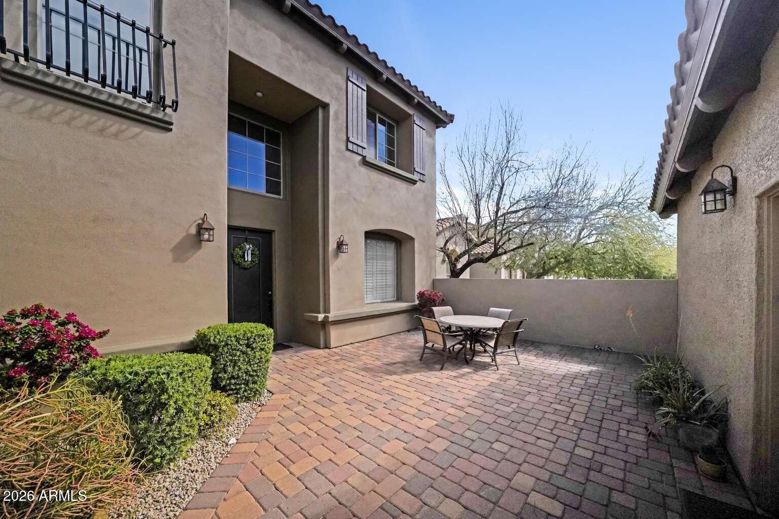 3978 East Hashknife Road Phoenix, AZ 85050 - Photo 3 of 29 a view of a patio with a table and chairs in patio