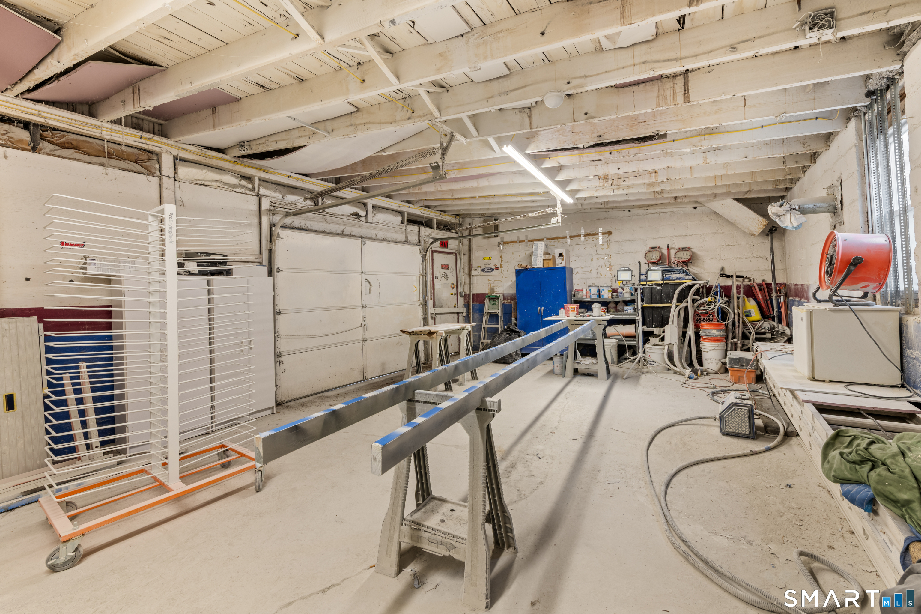 386 Huntington Road Bridgeport, CT 06608 - Photo 27 of 33 a view of a room with gym equipment