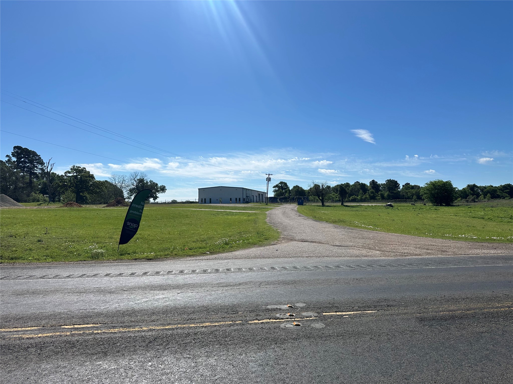 front view of a house with a big yard