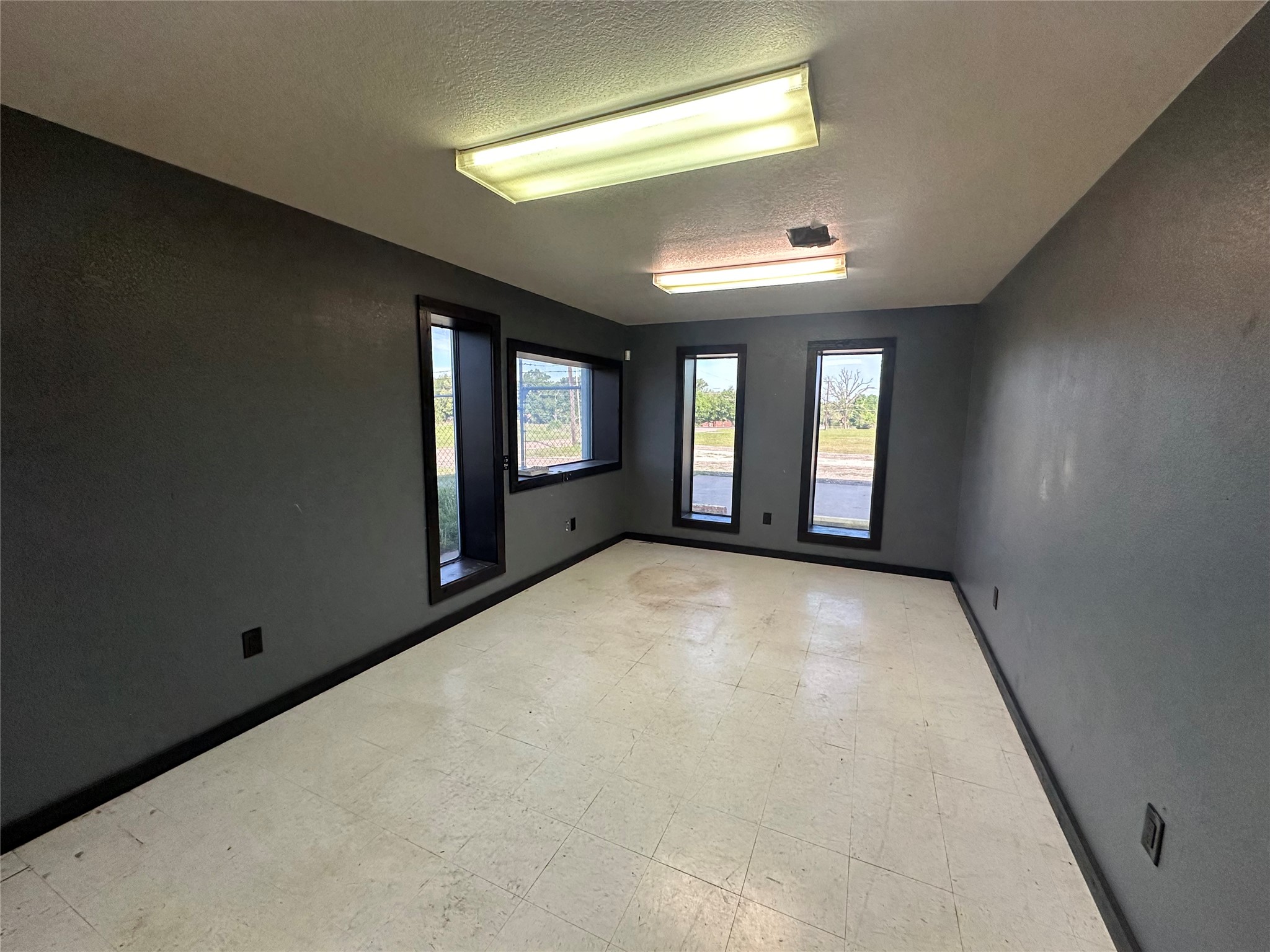 2013 Highway 79 Buffalo, TX 75831 - Photo 13 of 24 an empty room with windows