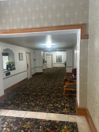 a bathroom with a sink tub shower and a mirror