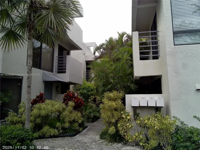 a close view of a sink and table in a kitchen