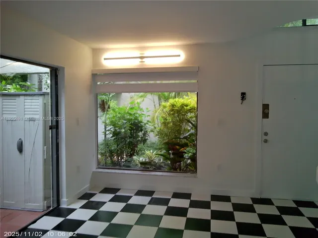 a black and white checkered floor with a black white checkered floor