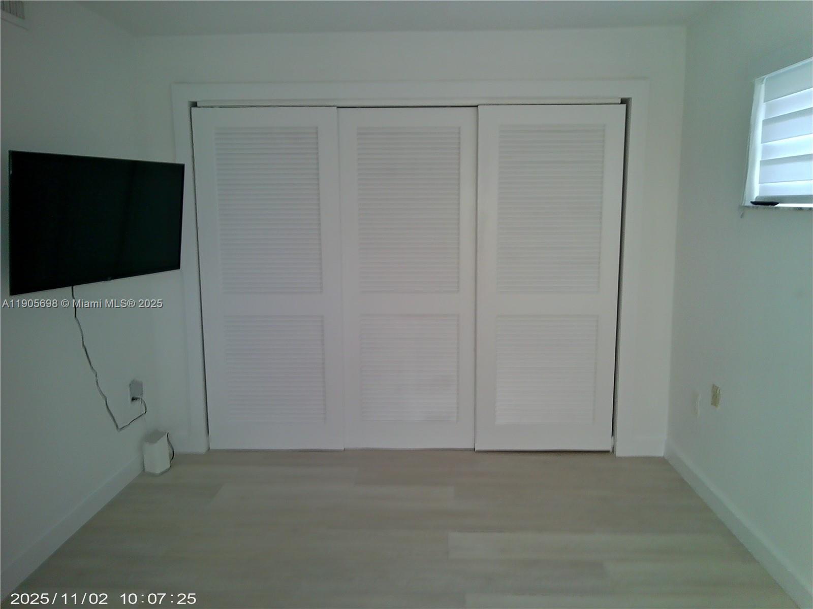 3036 Southwest 27th Avenue, Unit 5 Miami, FL 33133 - Photo 8 of 23 a view of an empty room