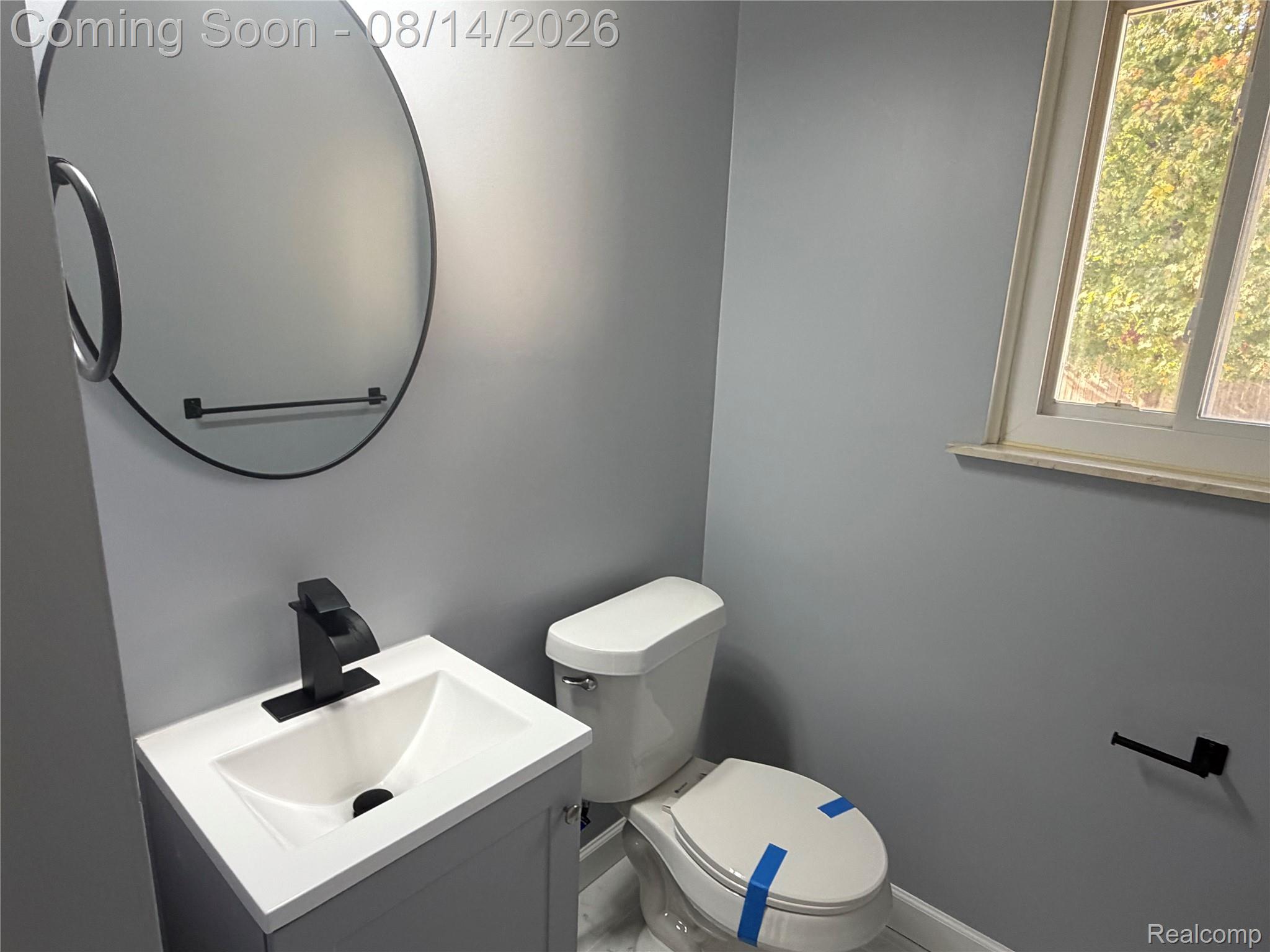 20698 Coachwood Road Riverview, MI 48193 - Photo 11 of 37 Vanity with integrated sink and matte black faucet
