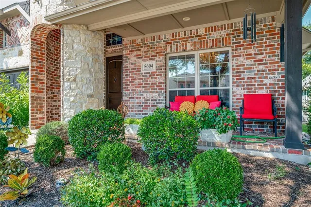 a house view with a garden space