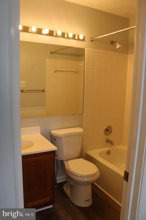 7313 Stream Way Springfield, VA 22152 - Photo 17 of 28 a bathroom with a toilet and a shower