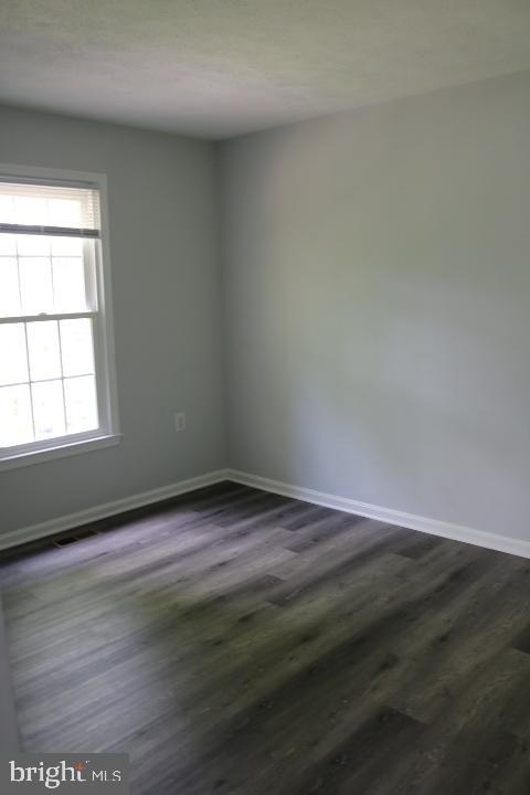 7313 Stream Way Springfield, VA 22152 - Photo 20 of 28 a view of an empty room and window