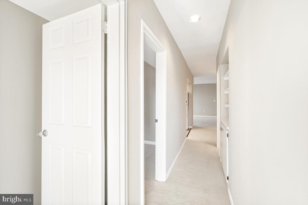 53 Skyhill Road, Unit 204 Alexandria, VA 22314 - Photo 18 of 26 a view of a hallway with white walls
