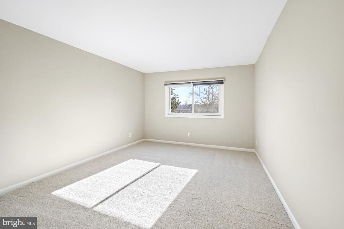53 Skyhill Road, Unit 204 Alexandria, VA 22314 - Photo 21 of 26 an empty room with windows