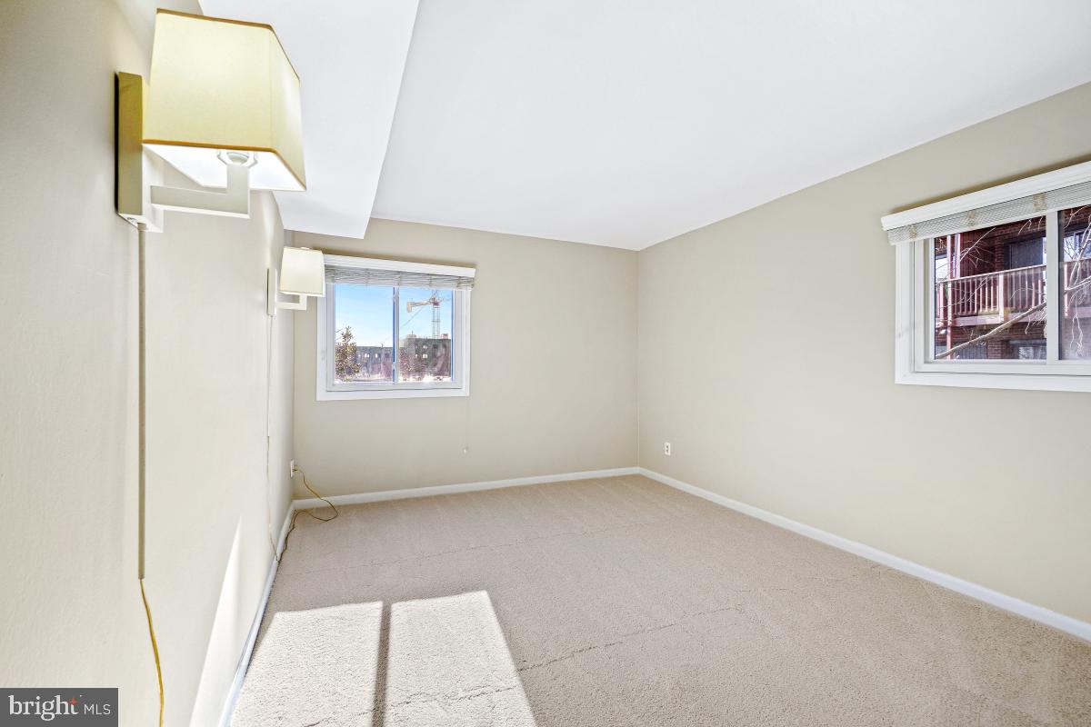 53 Skyhill Road, Unit 204 Alexandria, VA 22314 - Photo 24 of 26 an empty room with windows