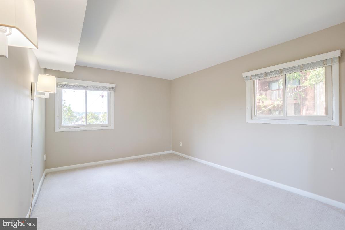 53 Skyhill Road, Unit 204 Alexandria, VA 22314 - Photo 25 of 26 an empty room with a window