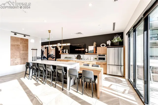 a room with table and chairs