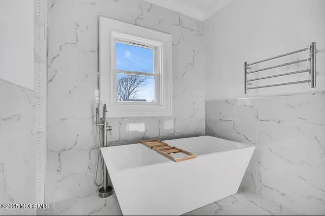 a spacious bathroom with a double vanity sink mirror and