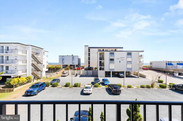 a view of a kitchen with appliances and cabinets