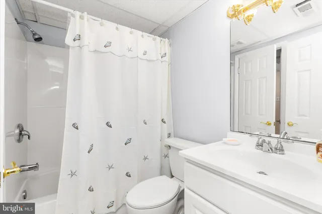 a view of bathroom with a sink and a toilet