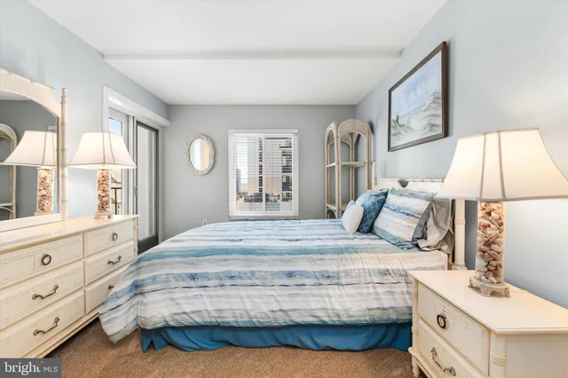 an aerial view of residential building and ocean