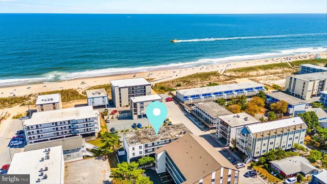 a view of a cars park in front of a house