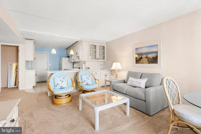 a kitchen with cabinets appliances a sink and a window