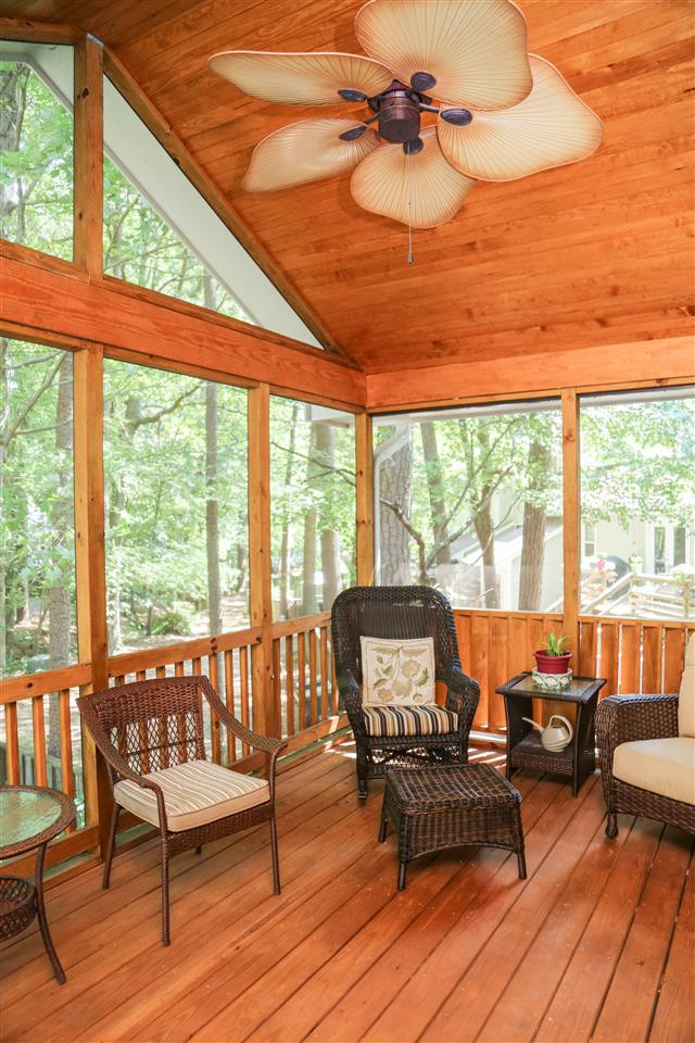 1520 Edgeside Court Raleigh, NC 27609 - Photo 18 of 30 Screen Porch tounge in grove wood ceiling and fan