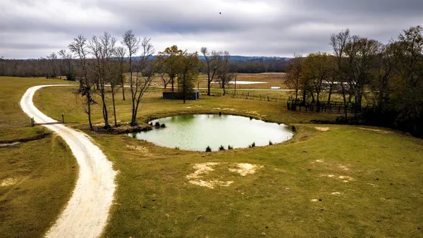 a view of a swimming pool with an ocean view
