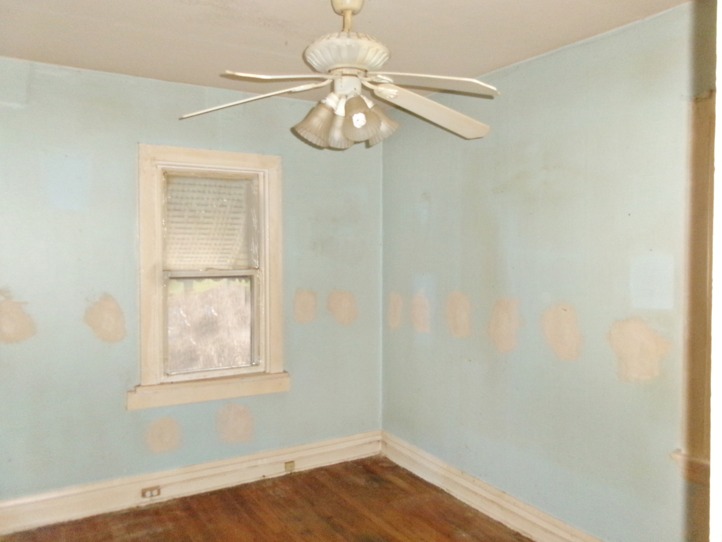 2011 Grey Avenue Evanston, IL 60201 - Photo 10 of 20 an empty room with a window and wooden floor