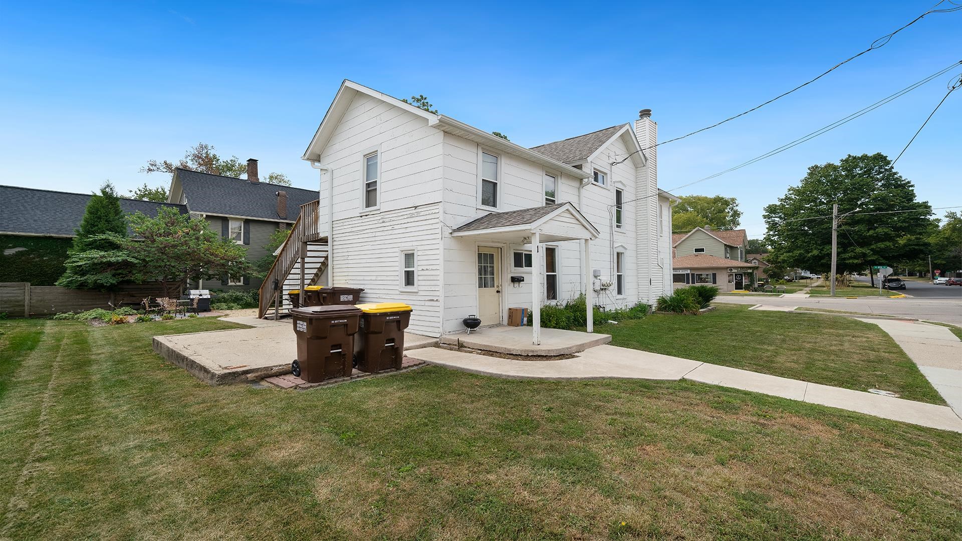 213 North 4th Street Oregon, IL 61061 - Photo 15 of 29 a view of a house with backyard and sitting area