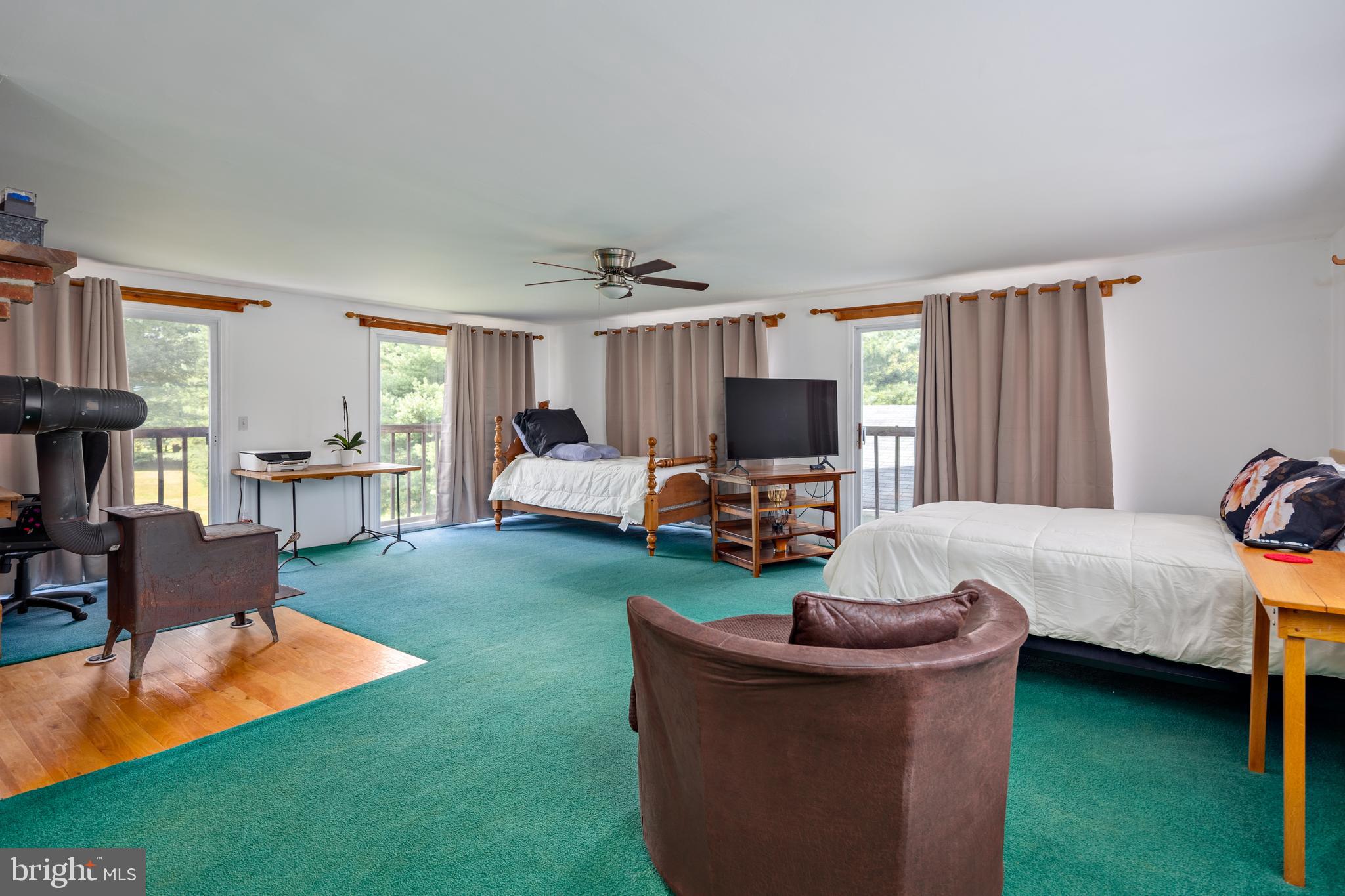 1045 Doyle Road Street, MD 21154 - Photo 19 of 49 a living room with furniture and a flat screen tv