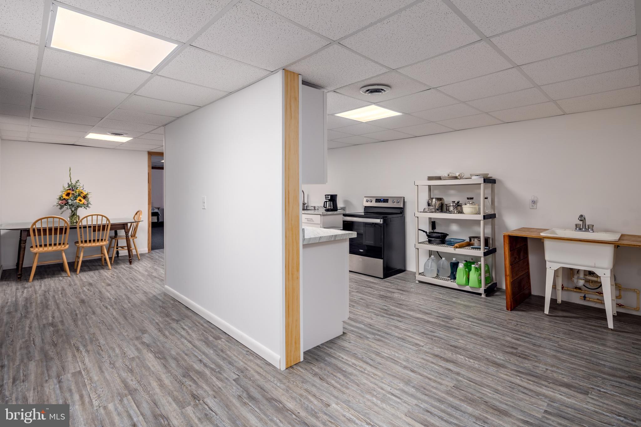 1045 Doyle Road Street, MD 21154 - Photo 27 of 49 a living room with furniture and a wooden floor