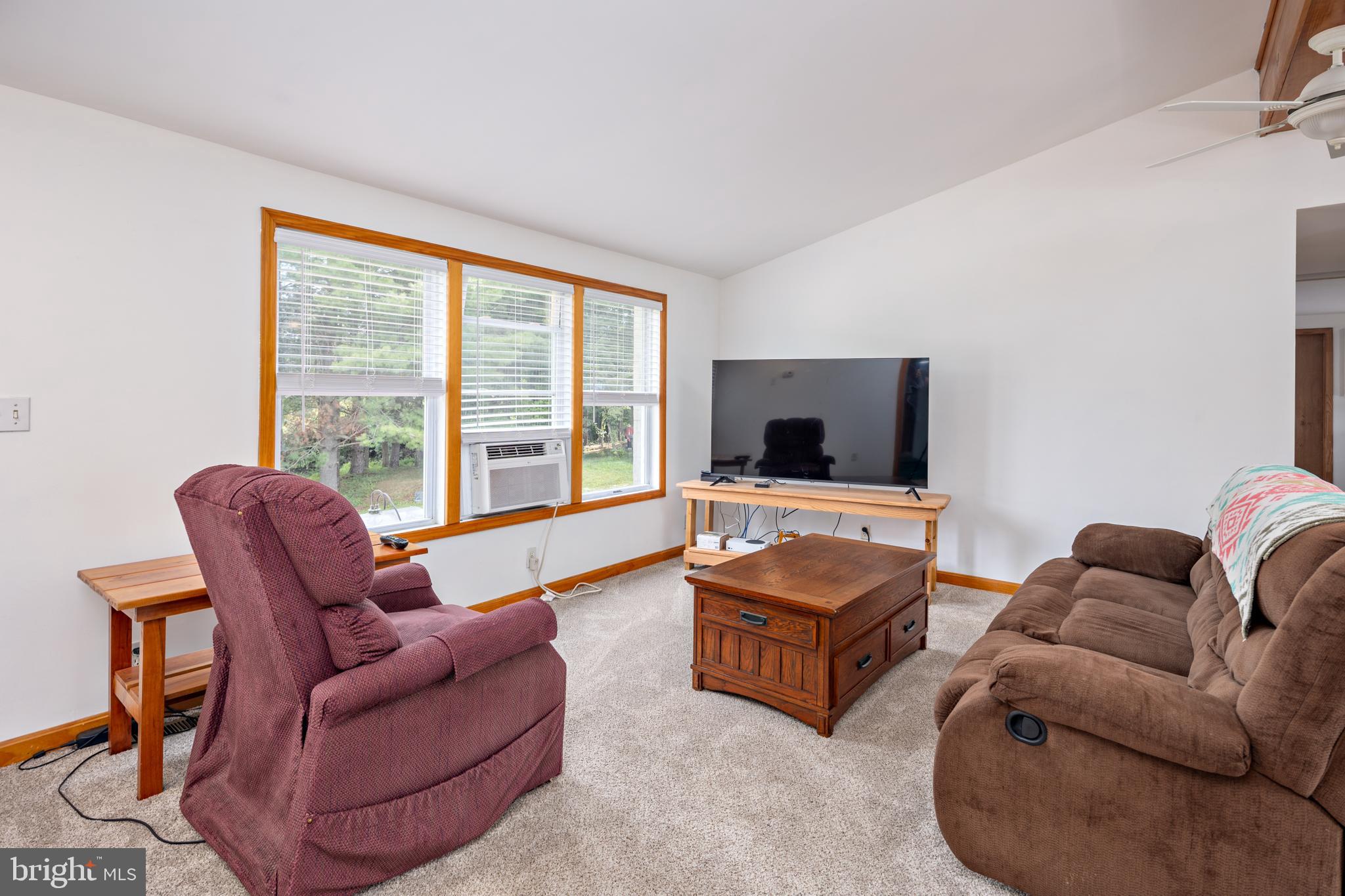 1045 Doyle Road Street, MD 21154 - Photo 4 of 49 a living room with furniture and a large window