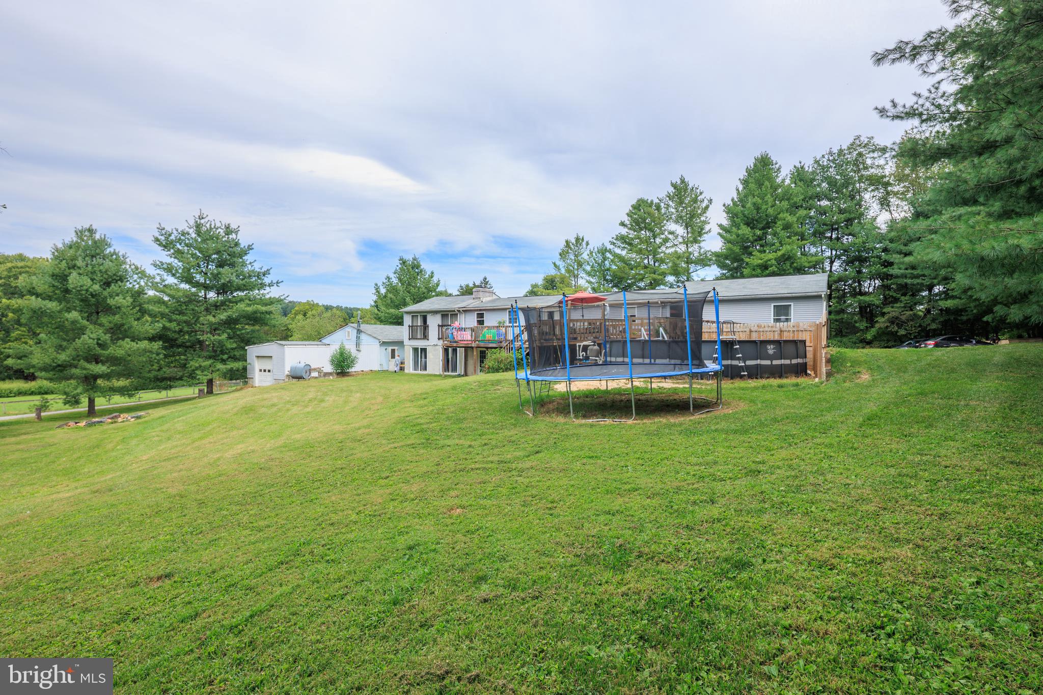 1045 Doyle Road Street, MD 21154 - Photo 47 of 49 a view of a house with a big yard