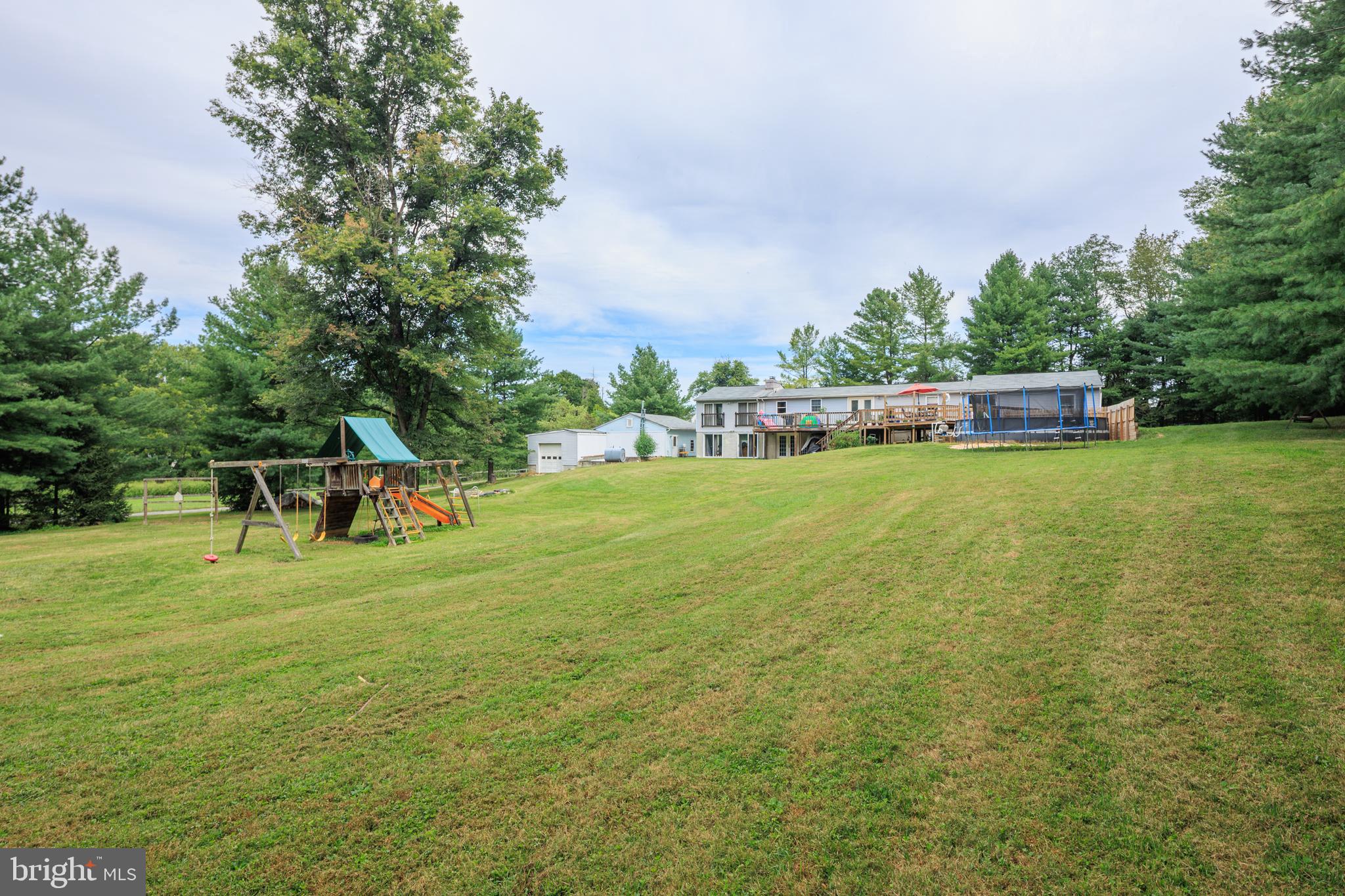 1045 Doyle Road Street, MD 21154 - Photo 48 of 49 a house with a garden