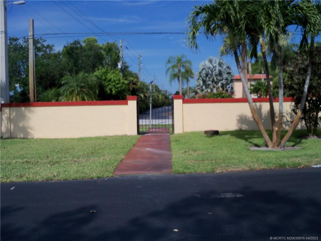 1997 Southwest Palm City Road, Unit 48E Stuart, FL 34994 - Photo 33 of 45 Gate close-by
