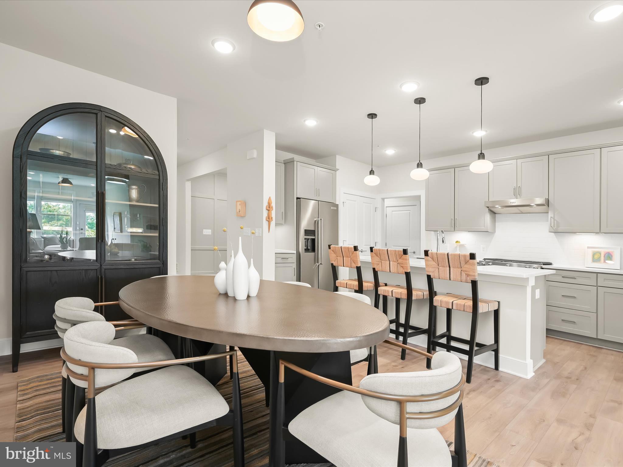 8023 Jennys Way, Unit 9 Fulton, MD 20759 - Photo 12 of 46 a view of a dining room with furniture and window