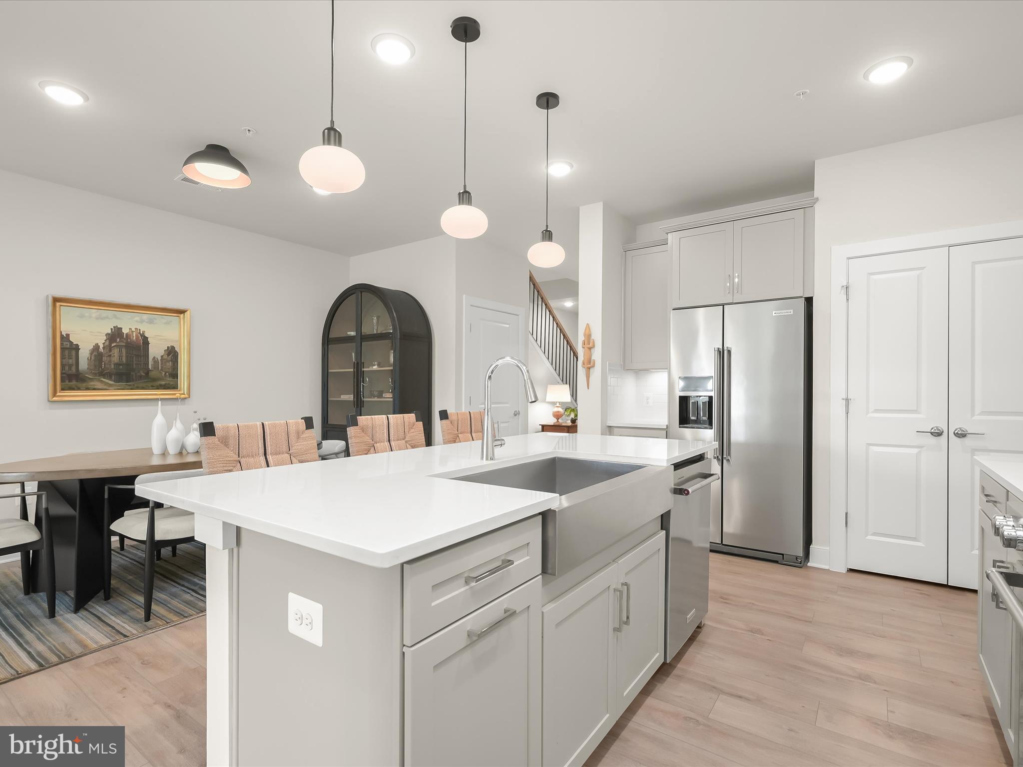 8023 Jennys Way, Unit 9 Fulton, MD 20759 - Photo 18 of 46 a view of a kitchen counter space a sink appliances and cabinets