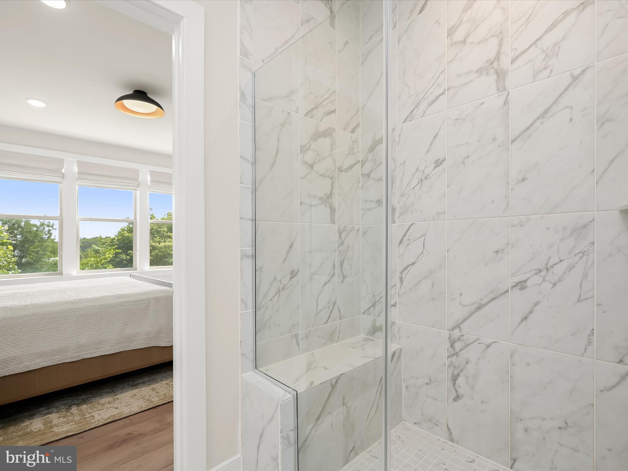 8023 Jennys Way, Unit 9 Fulton, MD 20759 - Photo 25 of 46 a bathroom with a bathtub and shower