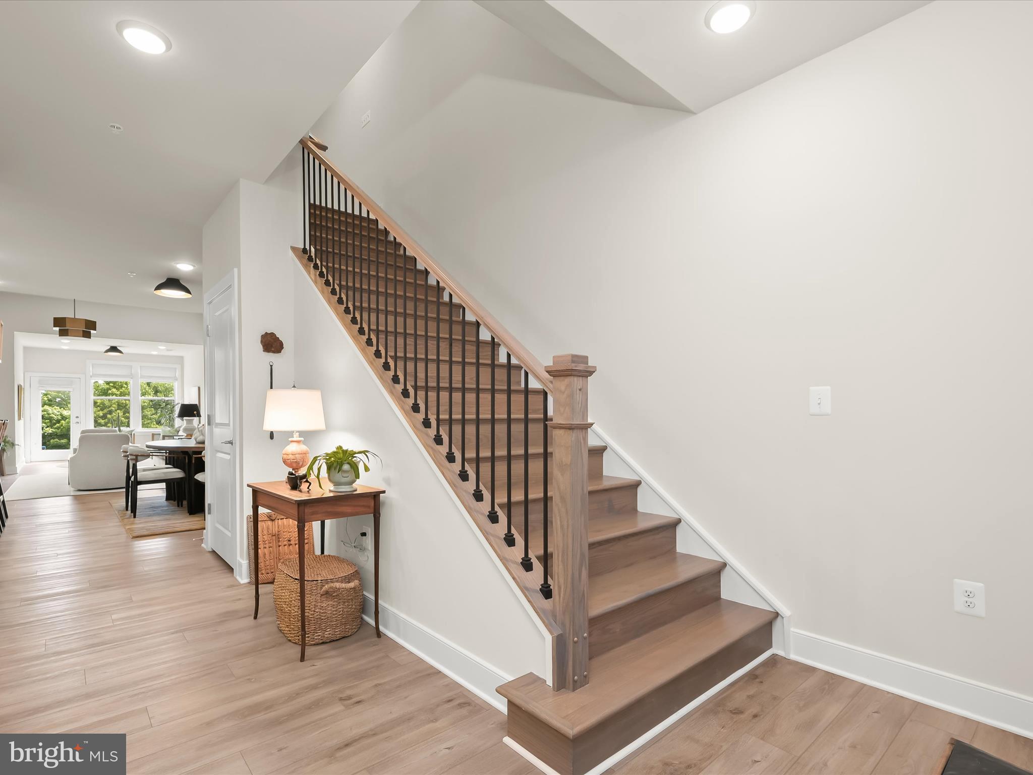 8023 Jennys Way, Unit 9 Fulton, MD 20759 - Photo 3 of 46 a view of entryway and hall with wooden floor