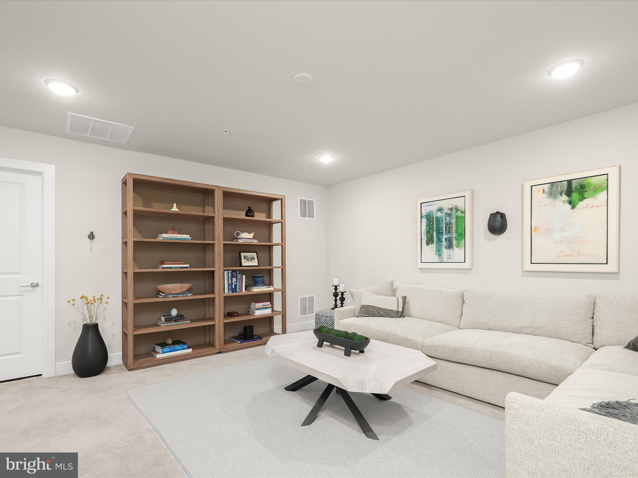 8023 Jennys Way, Unit 9 Fulton, MD 20759 - Photo 32 of 46 a living room with furniture and a window