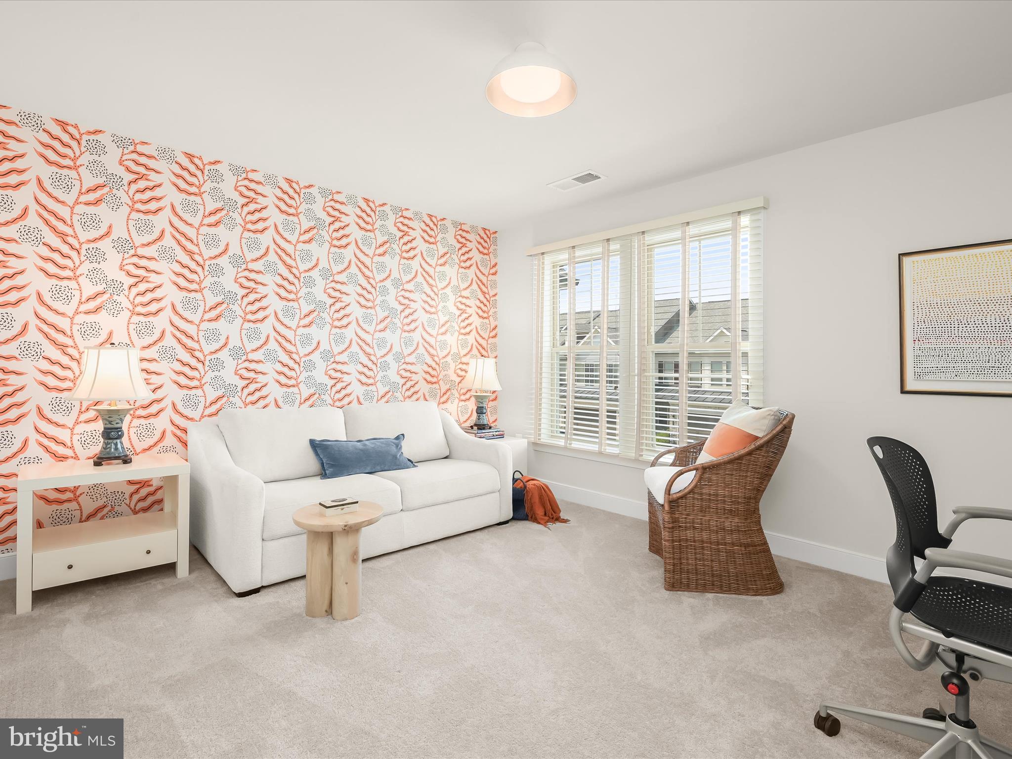 8023 Jennys Way, Unit 9 Fulton, MD 20759 - Photo 40 of 46 a living room with furniture and a lamp