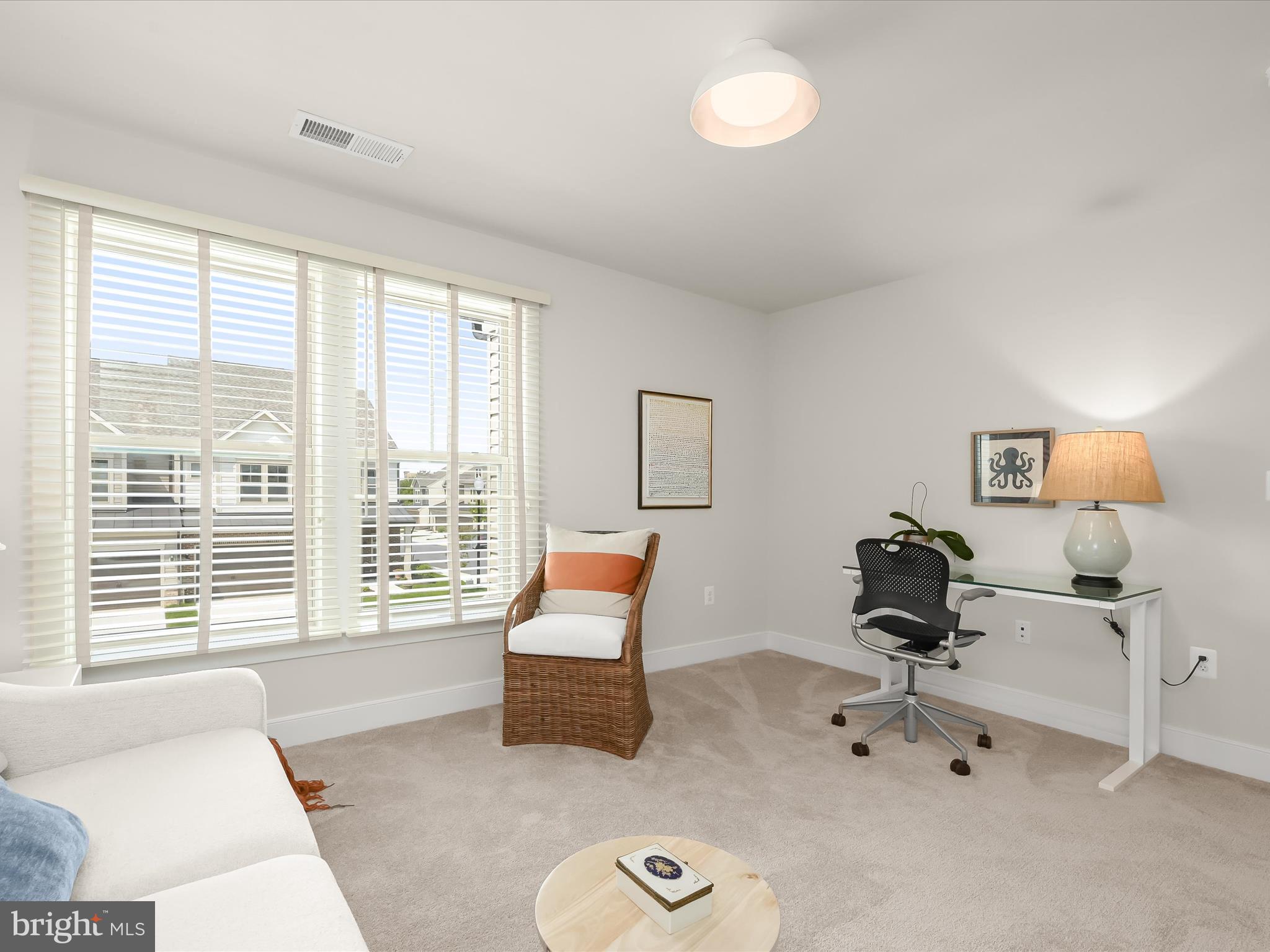 8023 Jennys Way, Unit 9 Fulton, MD 20759 - Photo 41 of 46 a living room with furniture and a window