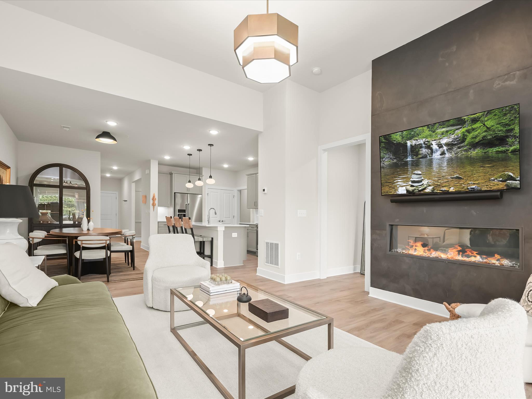 8023 Jennys Way, Unit 9 Fulton, MD 20759 - Photo 6 of 46 a living room with furniture and a fireplace